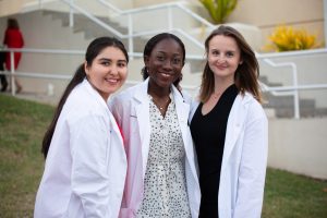 3 female students_white coats 2[1]