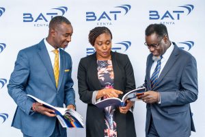 Rita Kavashe BAT Kenya Chairperson (middle), Crispin Achola BAT Kenya Managing Director (right), and Philemon Kipkemoi BAT Kenya Finance Director (left).